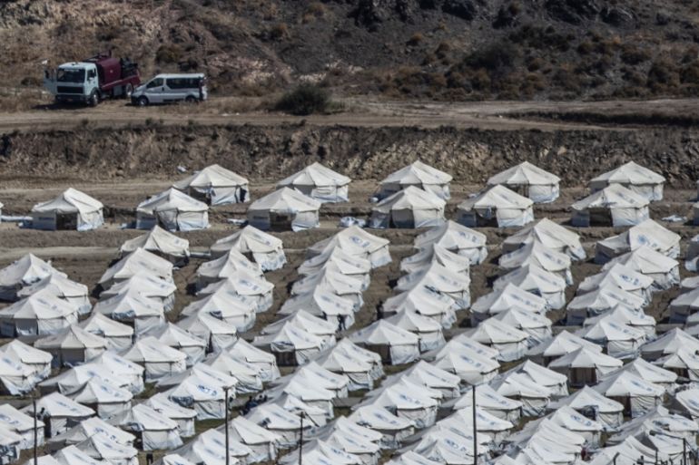 A general view of the temporary camp for refugees and migrants near Mytilene town, on the northeastern island of Lesbos, Greece, Sunday Sept. 13, 2020. Greek authorities have been scrambling to find a