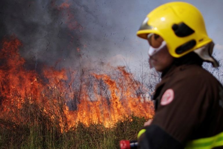 Firefighter Brazil Amazon rainforest wildfire