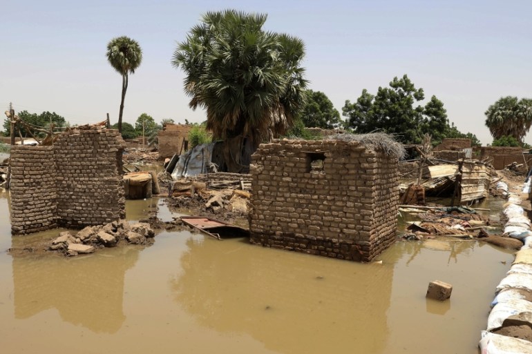 A neighborhood is flooded in the town of Alkadro, about (20 km) north of the capital Khartoum, Sudan, Saturday, Sept. 5, 2020. Sudanese authorities have declared their country a natural disaster area