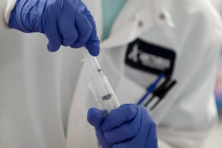 A scientist conducts research on a vaccine for the novel coronavirus (COVID-19) at the laboratories of RNA medicines company Arcturus Therapeutics in San Diego, California, U.S.,