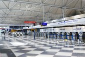 Rows of United Airlines check-in counters at O&#39;Hare International Airport in Chicago are seen unoccupied on June 25, 2020, amid the coronavirus pandemic [AP/Teresa Crawford]