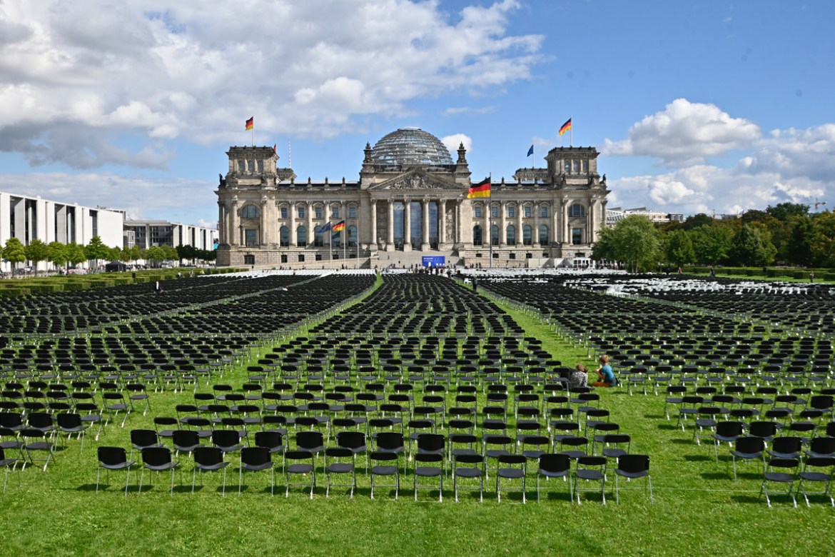 13,000 chairs are placed in front of the Reichstag building, seat of the German lower house of parliament Bundestag in Berlin on September 7, 2020, in an action to call for the evacuation of the Moria