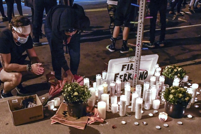 A makeshift memorial is set up, Wednesday, Sept. 2, 2020, in Rochester, N.Y., near the site where Daniel Prude was restrained by police officers. Prude, a Black man who had run naked through the stree