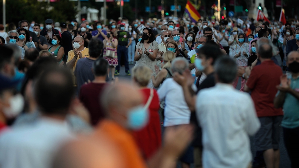 Protesters demand social structuring after pandemic in Madrid