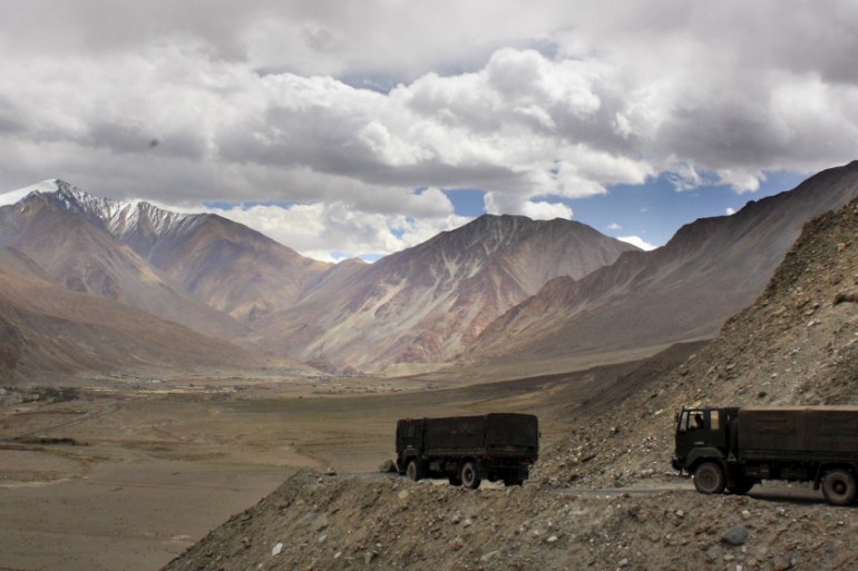 In this Sept. 14, 2017, photo, Indian army trucks drive near Pangong Tso lake near the India China border in India''s Ladakh area. India and China sought Wednesday, June 17, 2020, to de-escalate tensi