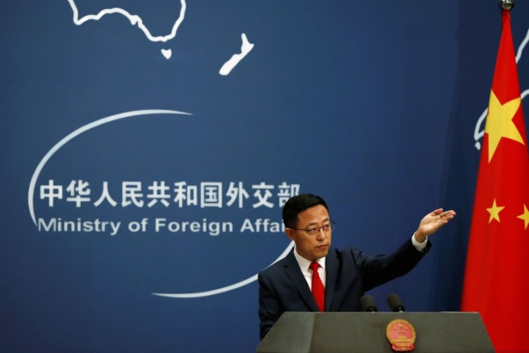 Chinese Foreign Ministry spokesman Zhao Lijian attends a news conference in Beijing, China