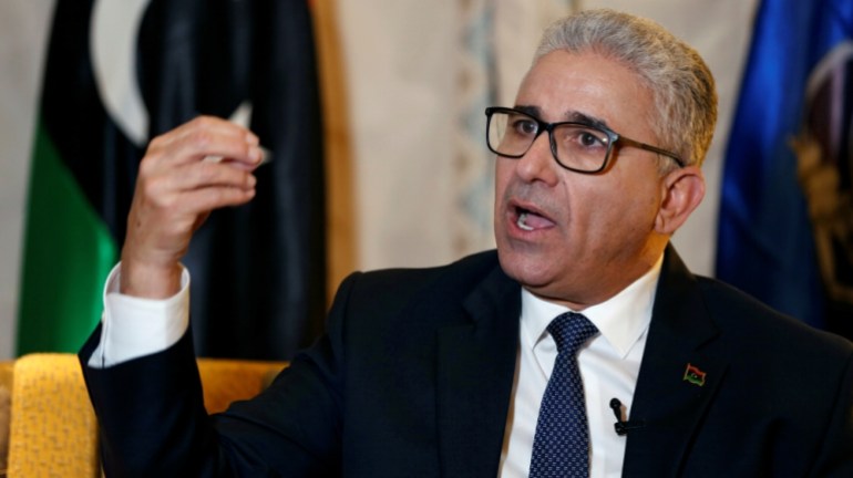El ministro del Interior de Libia, Fathi Bashagha, habla durante una entrevista con Reuters en Túnez.