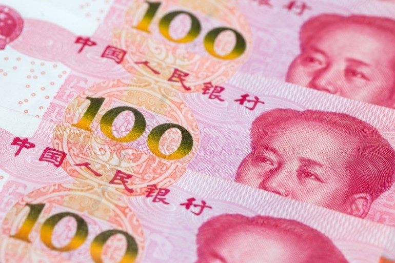 Chinese one-hundred yuan banknotes [File: Paul Yeung/Bloomberg]