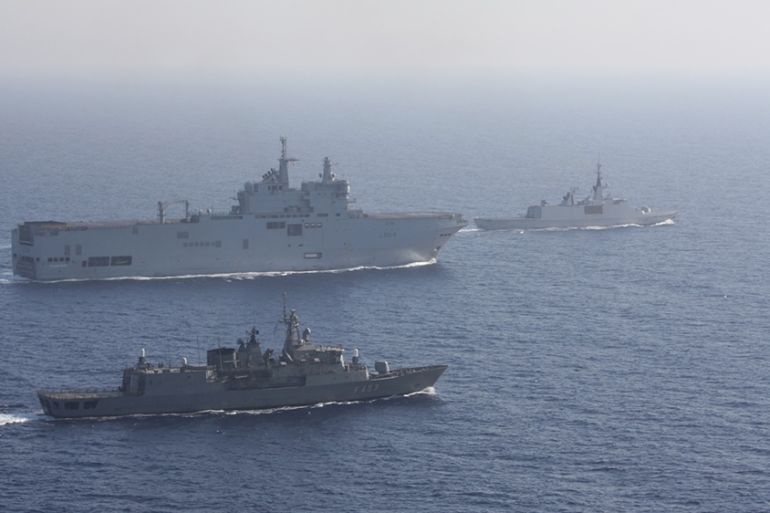 Greek and French vessels sail in formation during a joint military exercise in Mediterranean sea, in this undated handout image obtained by Reuters on August 13, 2020. Greek Ministry of Defence/Handou