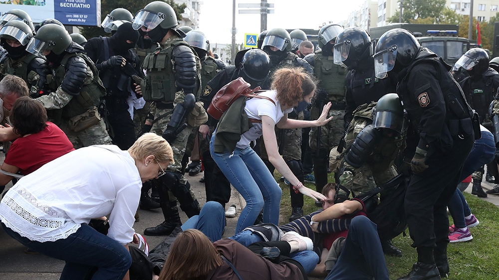 MINSK, BELARUS - SEPTEMBER 13, 2020: Law enforcement officers confront participants in the March of Heroes opposition event. Mass protests against the presidential election results have been occurring