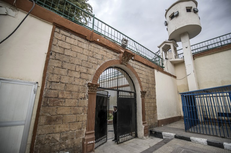 A photo taken during a guided tour organized by the State Information Service of Egypt on February 11, 2020, shows an Egyptian policeman standing guard at Torah Prison.