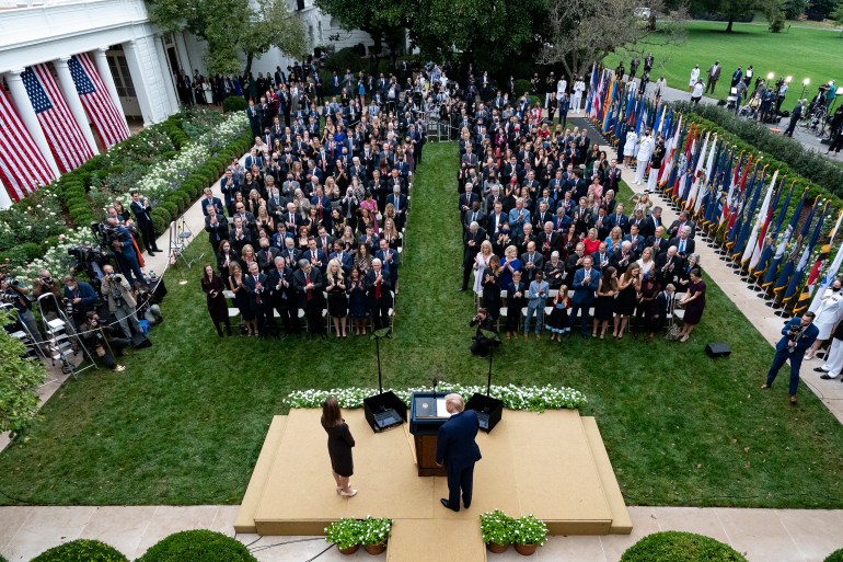 About 30 people contracted the novel coronavirus following the White House event at the Rose Garden [Alex Brandon/AP]