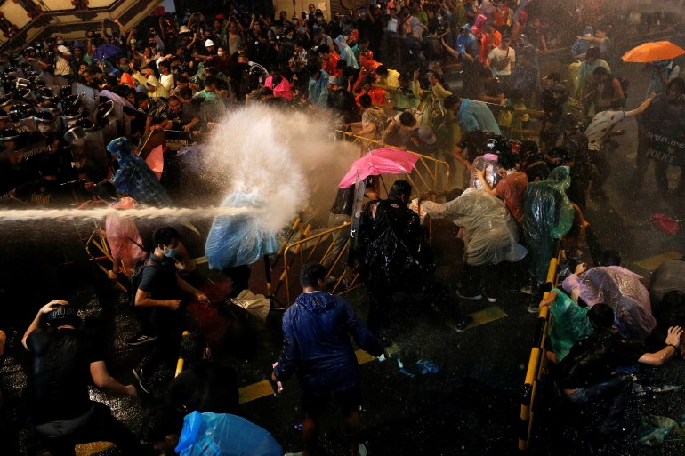 Thai police fire water cannon at Bangkok protesters | Thailand | Al Jazeera