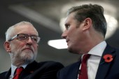 Former Labour Party leader Jeremy Corbyn and his successor Keir Starmer attend a general election campaign meeting in Harlow, Britain, on November 5, 2019 [Hannah McKay/Reuters]
