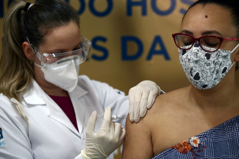 Companies have been racing to find a vaccine for the coronavirus, which has killed almost 1.5 million people [File: Diego Vara/Reuters]