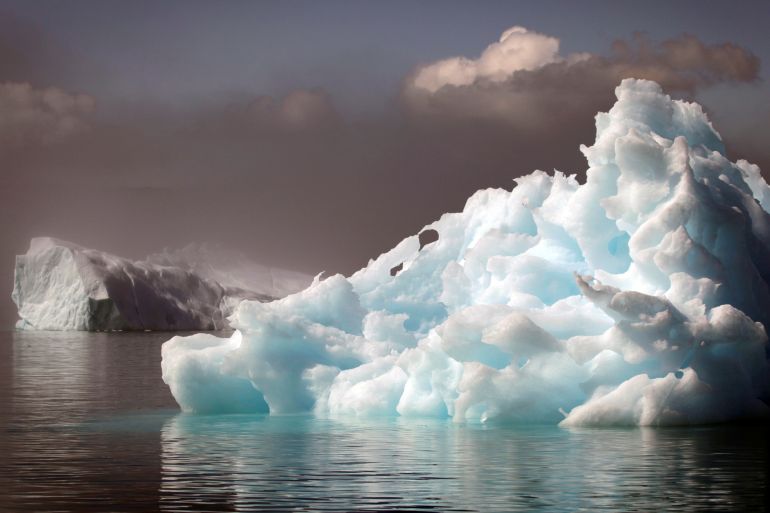 Icebergs float in a fjord near the south Greenland town of Narsaq