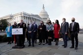 US Senator Tom Reed, co-chair of the Problem Solvers Caucus, and other members speak at a news conference on the forthcoming passage of the bipartisan emergency COVID-19 relief bill in Washington, DC on December 21, 2020 [File: Reuters/Ken Cedeno]