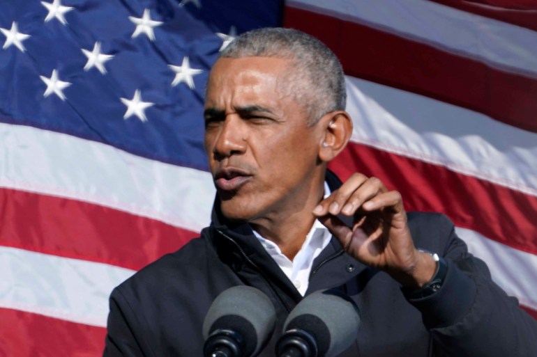 Former President Barack Obama speaks at a rally as he campaigns for Democratic presidential candidate former Vice President Joe Biden on Monday, November 2, 2020, at Turner Field in Atlanta [File: AP/Brynn Anderson]