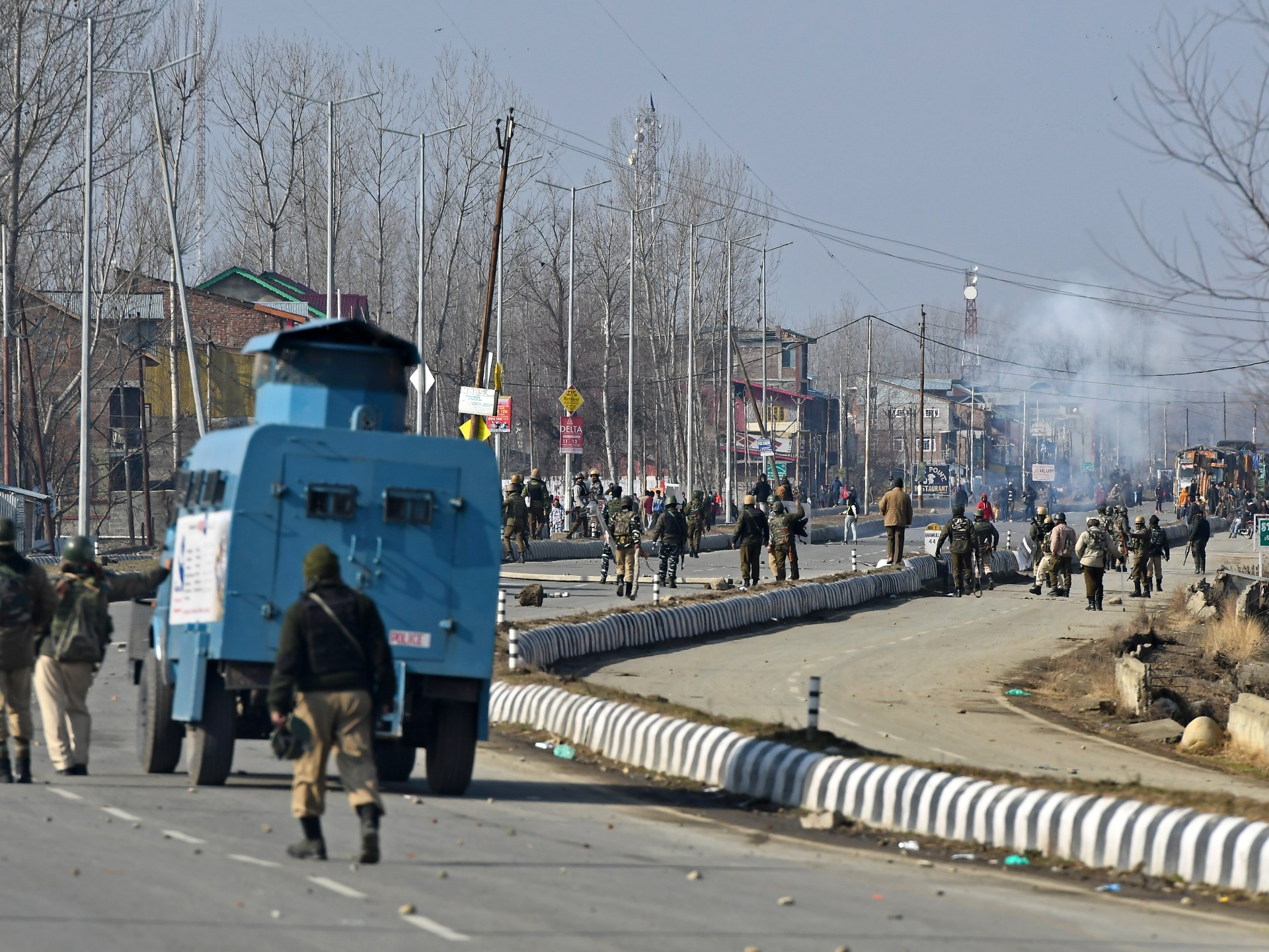 Protesters block Kashmir freeway after two shot lifeless at military camp