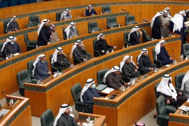 Kuwaiti MPs attend a parliament session