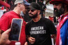 Enrique Tarrio, the Cuban-American leader of far-right group the Proud Boys interacts with supporters during a &#39;Latinos for Trump&#39; demonstration, at Tamiami Park in Miami, Florida, USA, on October 18, 2020 [Mario Cruz/EPA-EFE]