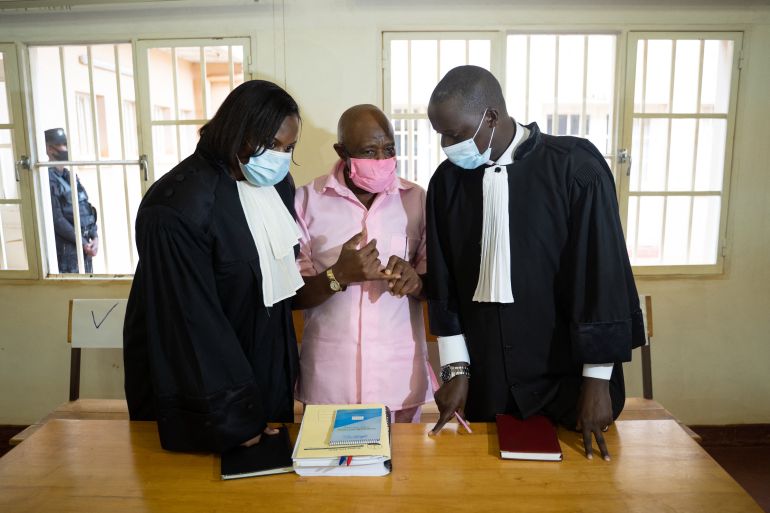 "Hotel Rwanda" hero Paul Rusesabagina (C) and his lawyer David Rugaza (R) are seen at the Nyarugenge Court of Justice in Kigali, Rwanda, on October 2, 2020.