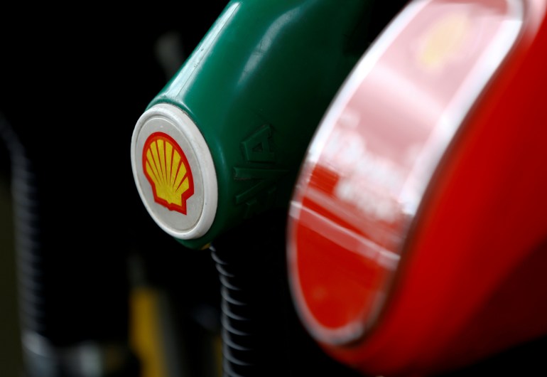 A Shell logo is seen on a fuel pump