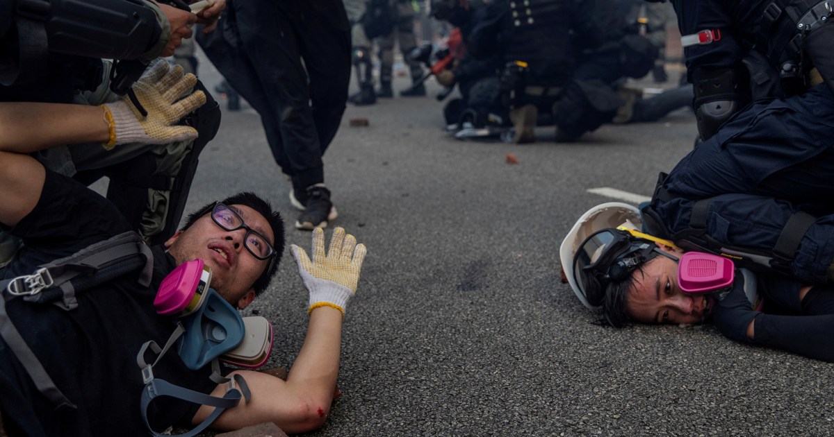Hong Kong police charge dozens of activists with security crime
