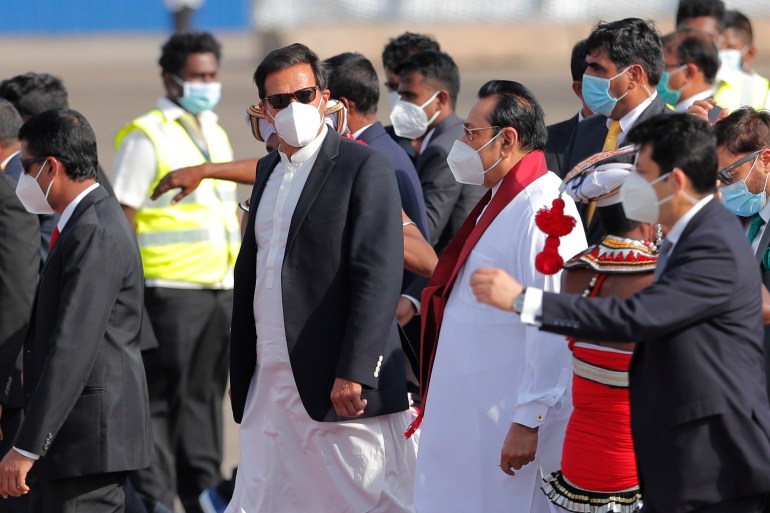 Pakistan's Imran Khan, left, during his two-day official visit to Sri Lanka [File: Eranga Jayawardena/AP]