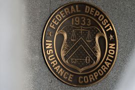 Signage hangs outside the Federal Deposit Insurance Corporation (FDIC) headquarters in Washington, D.C.
