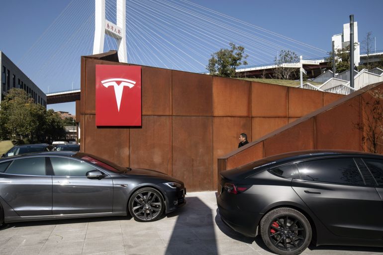 Tesla shares sink below S&amp;P entry level, wipe out 2021 gains | Financial Markets News | Al Jazeera