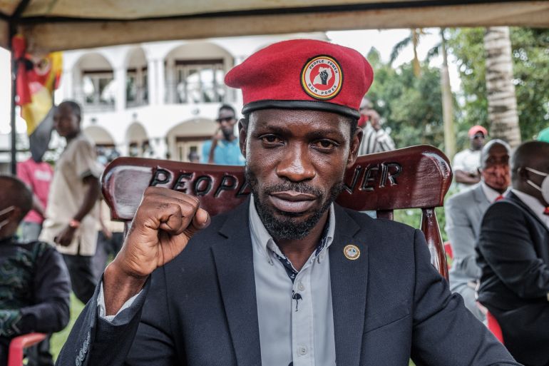 Ugandan opposition leader Robert Kyagulanyi, also known as Bobi Wine, poses for a photograph after his press conference at his home in Magere, Uganda, on January 26, 2021. - Ugandan soldiers have stood down their positions around the residence of opposition leader Bobi Wine, a day after a court ordered an end to the confinement of the presidential runner-up. He had been under de-facto house arrest at his home outside the capital, Kampala, since he returned from voting on January 14, 2021.