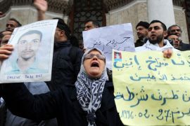 Family members of victims who disappeared during the war in Algeria in the 1990s shout slogans as they take part in a demonstration on March 15, 2014 calling for justice [File: Farouk Batiche/AFP]
