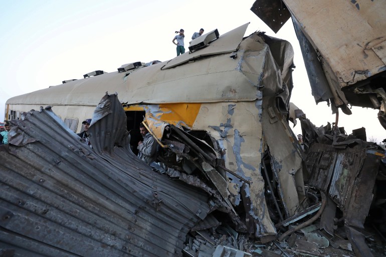 Egypt's railway authority said the two trains collided after emergency brakes were triggered by 