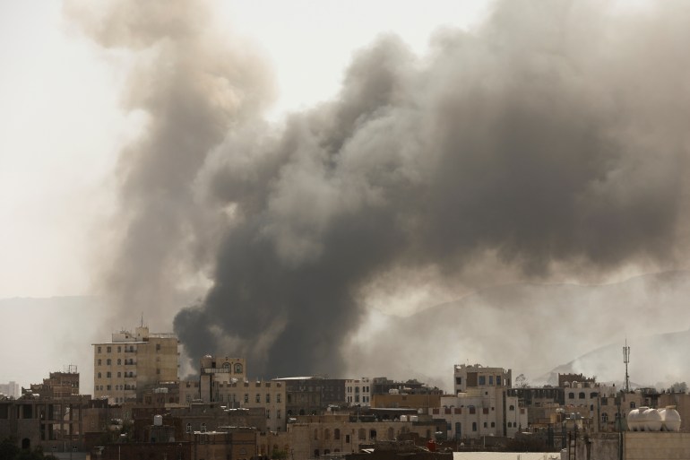 Smoke billows from the site of Saudi Arabia-led air attacks in Sanaa, Yemen March 7, 2021 [File: Khaled Abdullah/Reuters]