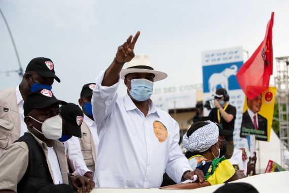 President and candidate for the presidential elections Denis Sassou Nguesso waves to a crowd at an election rally in Brazzaville, Republic of Congo, on March 19, 2021. REUTERS/Hereward Holland NO RESALES. NO ARCHIVES