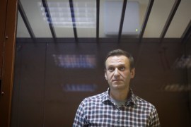 Alexey Navalny in a cage in a courthouse