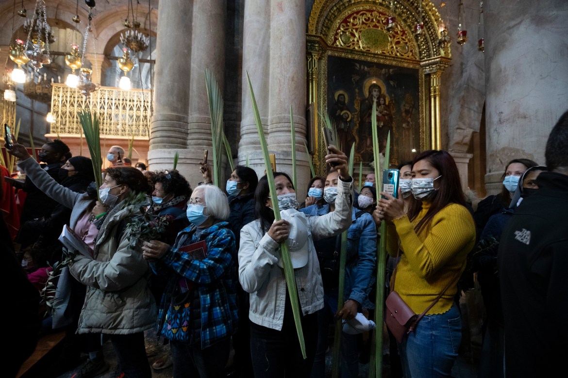 After a year of coronavirus restrictions, Holy Week celebrations are resuming. [Maya Alleruzzo/AP Photo]