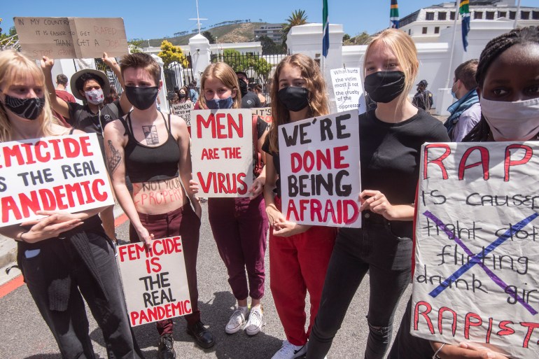 South African Women take part in a protest against gender-based violence nationwide gatherings during 16 Days of Activism on November 28, 2020 in Cape Town, South Africa. It is reported that about 200 protesters gathered outside parliament to protest against Gender Based Violence. (Photo by Brenton Geach/Gallo Images via Getty Images)