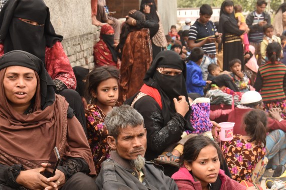 Rohingya Muslims gather outside a mosque in Jammu
