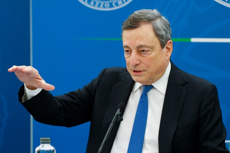 Mario Draghi speaks at a press conference