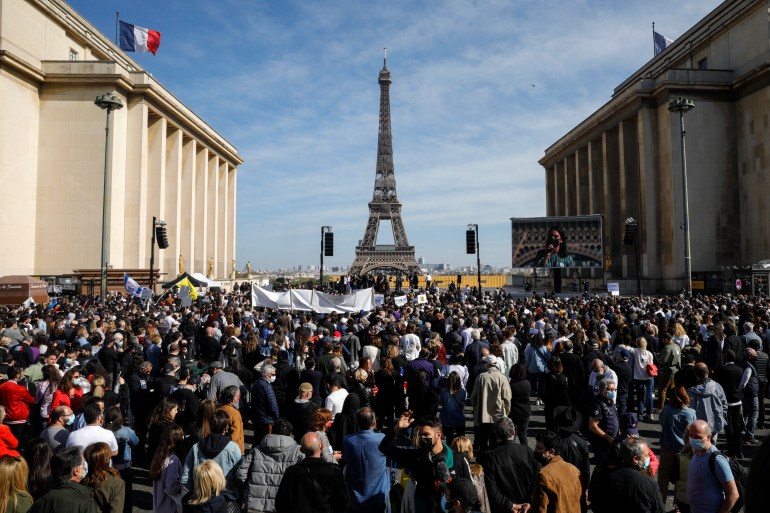 People gather to ask justice for late Sarah Halimi on Trocadero plaza in front of the Eiffel Tower in Paris [Geoffroy Van Der Hasselt/AFP]