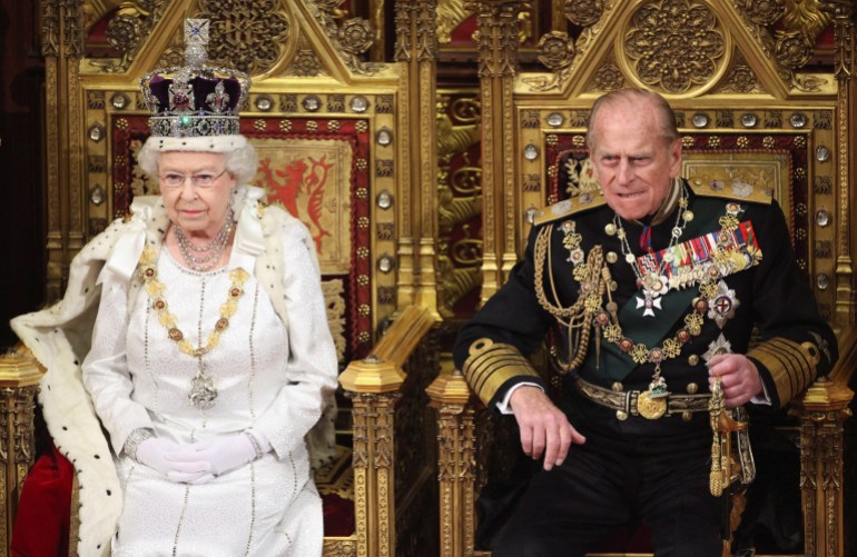 Britain's Queen Elizabeth waits to read the Queen's Speech to lawmakers in the House of Lords