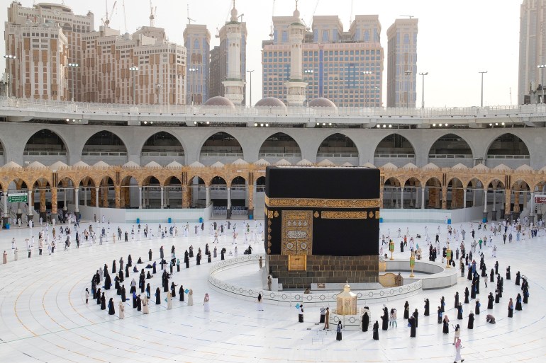 Muslim pilgrims keep social distance while performing their final Tawaf, marking the end of Haj pilgrimage, in the holy city of Mecca, Saudi Arabia, on August 2, 2020. [Sultan Al-Masoudi/Handout via Reuters]