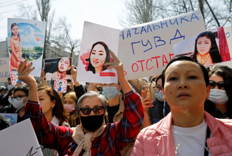 People attend a rally in front of Kyrgyzstan's interior ministry 