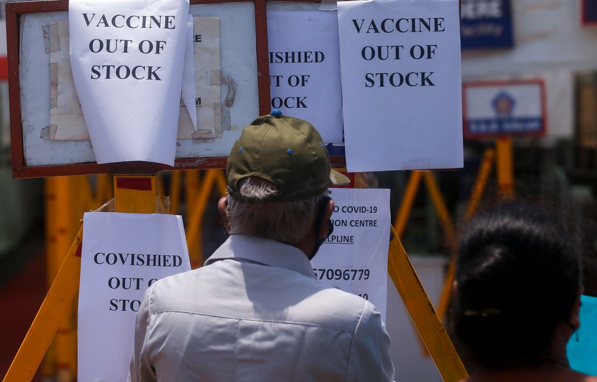 A notice informing about the shortage of COVID-19 vaccines is displayed at the entrance of a vaccination centre in Mumbai. [Rafiq Maqbool/AP Photo]