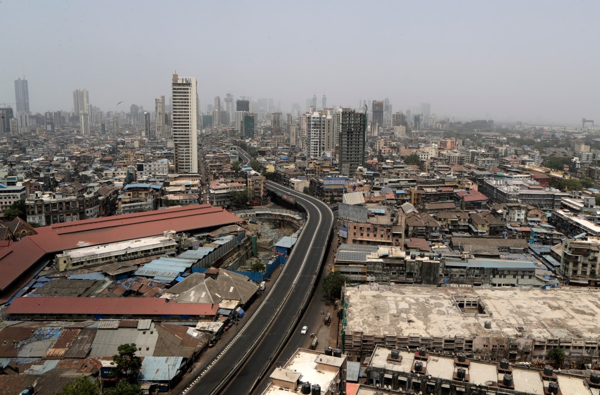 A street is seen deserted during the weekend lockdown in Mumbai. [Rajanish Kakade/AP Photo]