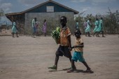 Children seen leaving school in Kakuma refugee camp, northwest Kenya, October 19, 2018 [File: Sally Hayden/SOPA Images/LightRocket via Getty Images]