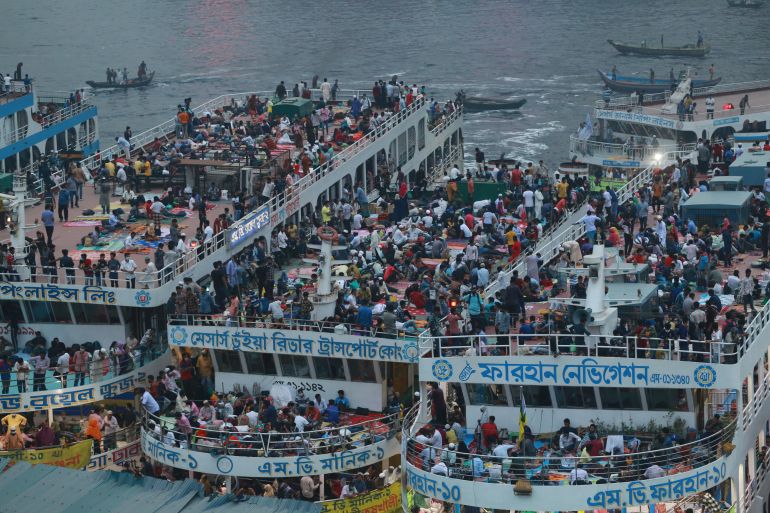 People packed on ferries traveling to their homes at Sadarghat ferry terminal as Bangladesh