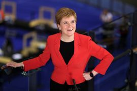 Scottish First Minister Nicola Sturgeon reacts as she gives a TV interview at a counting centre in Glasgow, Scotland, May 7, 2021 [Russell Cheyne/Reuters]